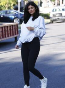 kylie jenner in Yoga pants with a sweatshirt