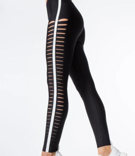 Yoga pants with side zipper and back zipper cutouts