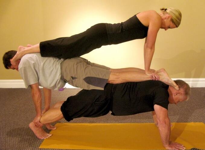 the plank yoga poses for 3 people